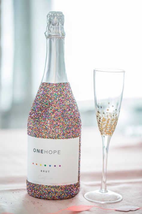 Shop our rainbow glitter bottle today and help support the Trevor Project 🌈 ✨ Sparkle Bottle, Alcohol Bottle Decorations, Custom Champagne Bottle, Bedazzled Bottle, Alcohol Bottle Crafts, Glitter Wine Bottles, Wedding Toast, Trevor Project, Glitter Champagne