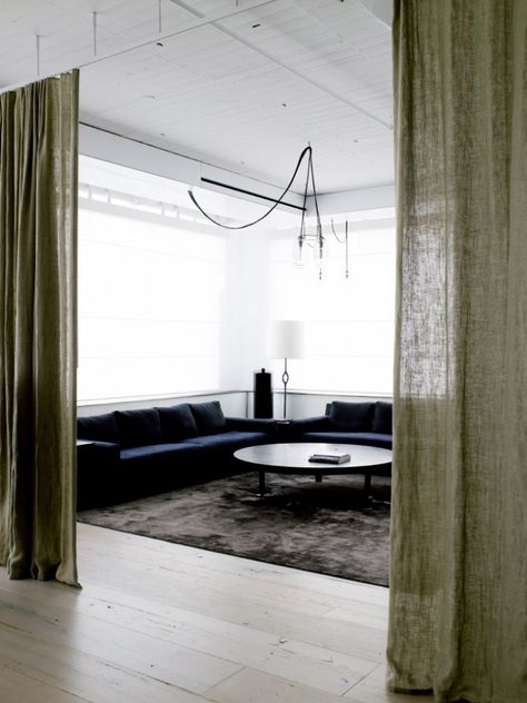 Downstairs by fireplace- curtain divider. A nice way to divide up a open floor plan. ~REB Fearon Hay, Curtain Divider, Nyc Loft, Tribeca Loft, Hanging Room Dividers, Diy Room Divider, Loft Stil, Decor Studio, Curtain Room