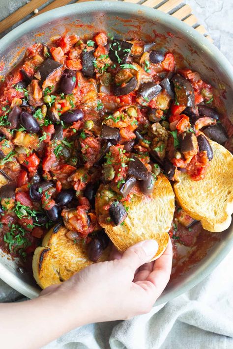 Eggplant caponata is an easy Sicilian appetizer that's full of flavor. It's vegan and you can serve it as a healthy dip with some crusty bread. It's a great addition to the dinner table and takes less than an hour to make. Serve caponata warm or cold, as an appetizer or a flavorful side dish! Italian Eggplant Recipes, Vegetarian Eggplant Recipes, Eggplant Caponata Recipe, Caponata Recipe, Aubergine Recipe, Eggplant Recipes Easy, Eggplant Caponata, Eggplant Recipe, Eggplant Dishes