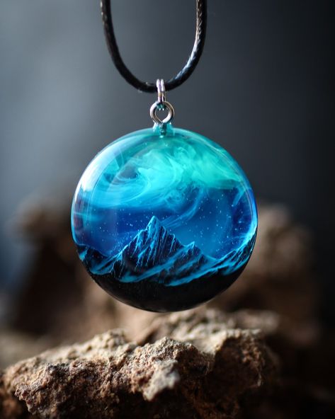 Handmade round pendant from black hornbeam wood and resin with mountain inside. Glow in the dark! Wood Resin Necklace, Wood Resin Jewelry, Fashion Design Patterns, Resin Artwork, Diy Resin Art, Wood Resin, Diy Resin Crafts, Wood Pendant, Resin Necklace