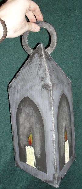 DIY: Victorian Candle Lantern made from cardboard.  Inexpensive.  Halloween Horrors in Victorian London Party Decorating & Ideas Cardboard Lantern, Victorian Candle, Victorian Candles, Cardboard Props, Set Construction, Play Props, Theatre Props, Medieval Party, London Party