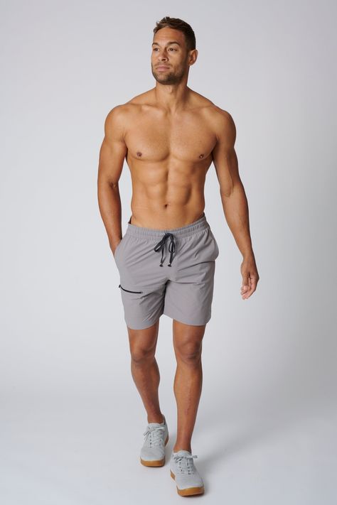 • Designed + Manufactured in Los Angeles • Sport Fit - 4 Way Stretch • Elastic Waistband with Drawstring • Signature Square Leisure Lab Side Pockets • Front Pocket with Zipper • 100% Polyester • 6.5 " Inseam • Model is 6'2" and wearing a Size 2 Body Fitness Men Model, Male Fitness Model Poses, Men Refrences Pose, Man Figure Reference, Muscular Men Reference, Male Anatomy Reference Models, Men Pose Reference, Men Model Poses, Body Type Male