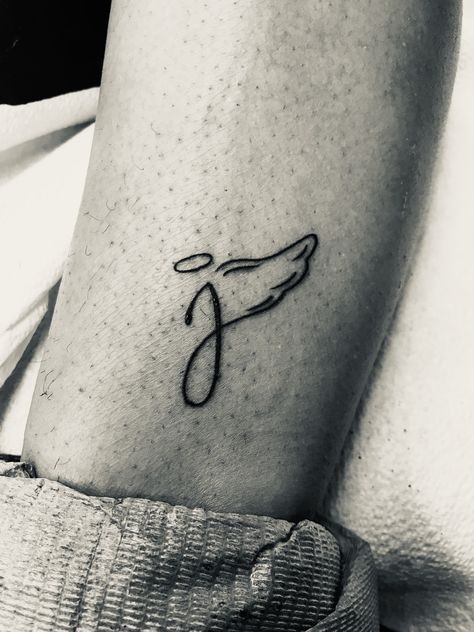 J with angel wings #smalltattooideas #meaningfultattoos #smalltattoosforwomen Small Tribute Tattoos, J With Wings Tattoo, Angel Halo Tattoo Ideas, In Memoriam Tattoo, J Memorial Tattoo, J Tattoos, J Angel Wing Tattoo, Tattoo Ideas Angel Wings, M With Angel Wings Tattoo