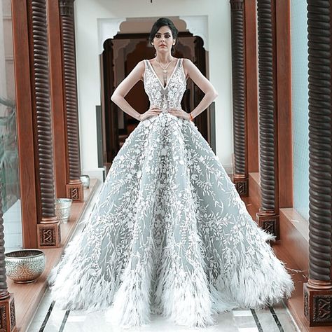 The stunning TAMARA AL GABBANI @tamaraalgabbani wears an exquisite dove grey fully beaded couture gown with feathers and crystals... @sayed5inco @asiancouturefederation @reemdresses @nada_zamzam8 @salon_korona_ #couture #dovegrey #ostrichfeathers #Dubai #MyDubai #MadeinDubai #MichaelCinco Gown With Feathers, Michael Cinco Couture, Beaded Couture, Feather Gown, Opulent Wedding, Michael Cinco, Red Carpet Gowns, Bridal Fabric, Dress Inspo