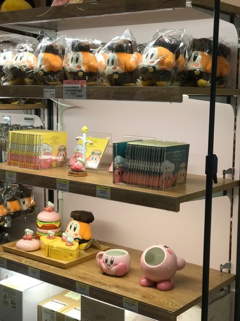 Kirby cafe merch available for purches, with kirby cups and dolls Kirby Merch Aesthetic, Kirby Merch, Cafe Merch, Kirby Cafe, Merch Aesthetic, Be Blessed, Kirby, My Favorite Things, Favorite Things