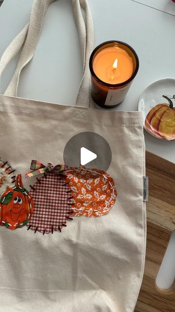 Leah on Instagram: "Cutest lil diy! Super easy too! I will be uploading a full tutorial to my YouTube channel! For supplies needed: Comment TOTE below to receive a DM with the link to shop this post on my LTK ⬇ https://liketk.it/4PCEb  Pumpkin Fall diy tote  #ltkvideo #ltkseasonal #fallvibes #autumn #fallcraft #gilmoregirls #pumpkin #diycrafts #leahsguides" Diy Canvas Bag Decorating, Fall Bag In Coated Canvas With Removable Pouch, Fall Canvas Bag Painting Ideas, Fall Everyday Canvas Bags, Cavas Bag, Fall Coated Canvas Tote Bag, Fall Season Canvas Tote Bag For Everyday Use, Patchwork Diy, Diy Tote