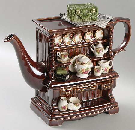 Tea Pots Unique, Teapot Unique, Unusual Teapots, Old Tea Pots, Antique Hutch, Tea Pots Art, Tea Cabinet, Cute Teapot, Novelty Teapots