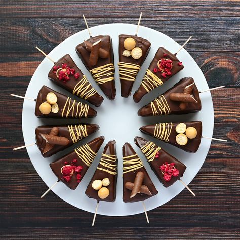 Baked Cheesecake Sticks Dipped Cheesecake On A Stick, Cheesecake Sticks, Cheesecake On A Stick, Chocolate Dipped Cheesecake, Chocolate Dip, Entree Dishes, Baked Cheesecake, Freeze Dried Raspberries, Make Ahead Desserts