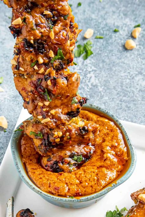 Chicken Satay with Peanut Sauce - Chili Pepper Madness Thai Chicken Skewers With Peanut Sauce, Malaysian Satay Chicken Recipe, Thai Satay Chicken, Chicken Satay Sides, Satay Sauce Recipe Easy, Peanut Sauce For Chicken, Thai Dinner Party, Skewer Chicken, Peanut Chicken Satay