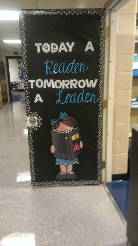 My Classroom Door! (Perhaps more pictures to come at a later date!)For those of you that weren't aware, I changed jobs this year. I am now a Title One Reading and Math Teacher for grades K-3.  It is d Room Door Ideas, Reading Bulletin Boards, Teacher Doors, School Doors, Elementary Library, English Classroom, Reading Teacher, Door Decorations Classroom, Classroom Bulletin Boards