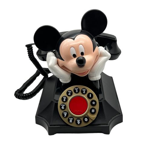 A Vintage 1990’s Disney Mickey Mouse Telemania Working Desk Landline Telephone By Segan Products. Mickey Is Reclining With His Feet Up In The Air And His Legs "Cradle" The Receiver. It Has A Push Button Design And You Can Set It For Both Tone And Pulse. It Also Features A Redial Button, Ringer On/Off Switch, Fcc Approved, And Etl Listed. It Is Marked “Disney” On The Back Of Mickey’s Head. This Phone Has Been Tested And Is In Excellent Working Order. Minor Light Scratches Consistent With Age. Cor Mickey Mouse Phone, Crazy Houses, Working Desk, Wooden Cheese Board, Desk Phone, Work Desk, Underwater Photography, Mickey And Friends, Blush Makeup