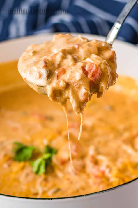 Everybody raves over Crock Pot King Ranch Chicken Soup. It's a super easy, crave-worthy meal that tastes just like your favorite casserole! #realhousemoms #crockpot #kinfranchchicken #chickensoup #soup #slowcooker #comfortfood #chicken #cheese #bellpepper #creamcheese #tacoseasoning Cool Ranch Doritos Cheese Soup, Crockpot King Ranch Chicken Soup, King Ranch Soup, Fiesta Ranch Chicken Crockpot, Crockpot Soup With Chicken, Chicken Bacon Ranch Soup, Crockpot Chicken Soup Recipes, King Ranch Chicken Soup, Ranch Chicken Soup