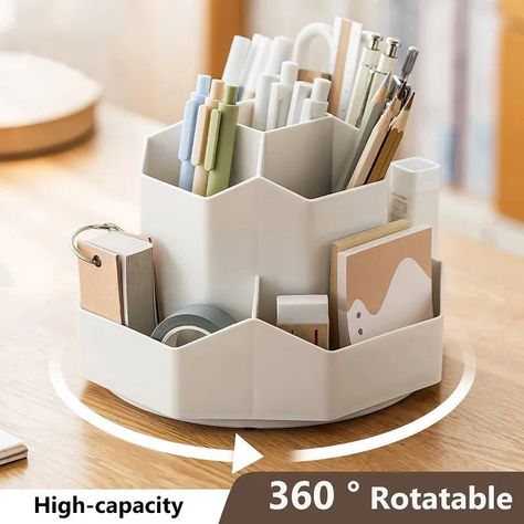 360° Rotatable Pen Holder 🌟 Why you need it - Say goodbye to clutter and hello to productivity! This pen stand keeps your workspace tidy and professional. 🔥 Why you’ll love it - Enjoy the convenience of easily rotating between different pens and stationery items with a simple turn. Its sleek design and durable construction make it a must-have for any workspace. • • • • #stationery #stationeryaddict #planner #stationerylove #stationeryshop #stationary #notes #paper #smallbusiness #rgwstation... Stylish Desk Accessories, Stationery Organizer, Art Supplies Storage, Utility Shelves, Pencil Storage, Pen Stand, Garage Storage Organization, Desk Supplies, Large Desk