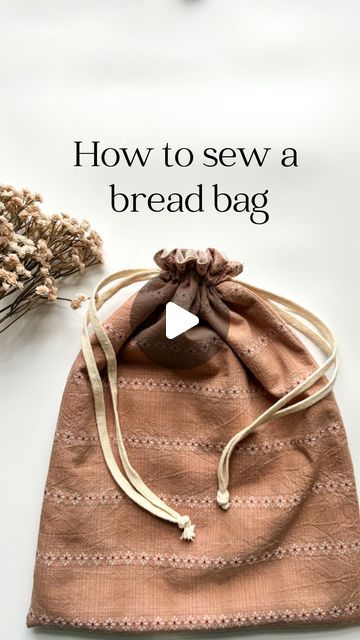 65K views · 2.5K likes | Amelia Mccall- teaching moms to sew children's clothes on Instagram: "🥖Let’s sew a linen bread bag! This is great for sourdough or any homemade bread!🍞  🥖 Cut 4 pieces of fabric measuring 13”x17” (2 main and 2 lining) 🍞Put your main pieces right sides together and make a line 1” down and then another line 3/4” down from that. 🥐Sew down the sides, skipping the part in between the two lines you drew then sew along bottom and other side, again skipping the part in between the lines.  🥖For the lining, sew around 3 sides, leaving a 3” hole for turning it right side out.  🍞Flip lining right side out and put it down inside the main fabric.  🥐Sew all the way around the top of the bag 🥖Close up the hole in the lining  🍞Now sew a tunnel by sewing a line of stitchin Bread Bag Pattern, Linen Bread Bag, Bread Bag, Bread Bags, Bag Patterns To Sew, Fabric Projects, How To Make Bread, Sewing Bag, Homemade Bread