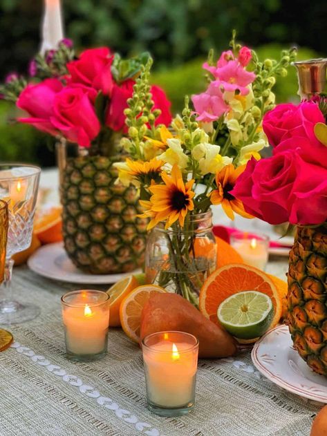 Looking for Hawaiian party theme ideas? Follow these simple tips to hosting an elegant luau party friends and family won't forget. #hawaiianpartydecorations #hawaiianthemeparty #luaupartyideas #luauparty #luauthemeparty #luaupartyideasdecorations #luaupartydecorations Campinas, Elegant Hawaiian Party, Classy Hawaiian Theme Party, Elegant Luau, Layered Table, Pineapple Centerpiece, Island Chic, Luau Food, Luau Decorations