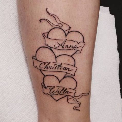 between siblings. This tattoo idea could resonate deeply with parents Tattoos Dedicated To Siblings, Childs Name Tattoo Ideas, Sibling Tattoos For 3 Meaningful, Unique Family Tattoos, Tattoo Ideas For Parents, Parents Tattoo Ideas, Siblings Tattoo For 3, Soccer Tattoos, Dynamic Tattoo