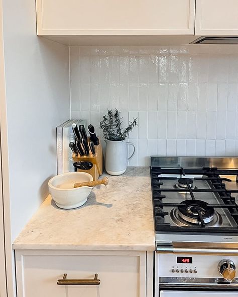 @kintirrabinhouse have created the most beautiful family kitchen. I�’m loving all the textures and that oven !!! They picked our Noosa in white tile in a vertical stack as the splashback tile and it looks amazing 😻 White Vertical Tiles Kitchen, Vertical Splashback Tiles, 3x12 Subway Tile Backsplash Kitchen Stacked, Oven Range Tiled Splashback, White Tile Splashback, Kitchen Tiling, Topps Tiles Zellica Antique White, Splashback Kitchen, Kitchen Splashback Tiles