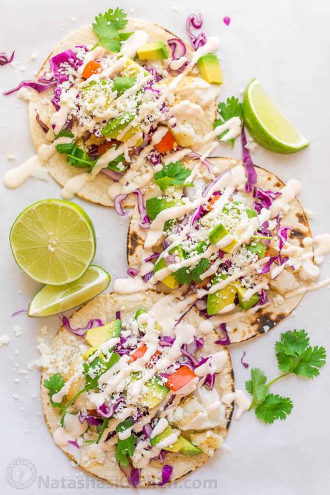 Fish Tacos Recipe with Best Fish Taco Sauce! - NatashasKitchen.com Best Fish Taco Sauce, Fish Taco Toppings, Slaw For Fish Tacos, Fish Tacos With Cabbage, Natashas Kitchen, Fish Taco Sauce, Taco Ingredients, Fish Taco, Fish Tacos Recipe