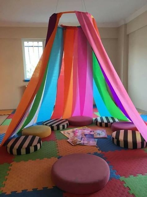 With a hula hoop and some spare curtains, an area in the class can be transformed into a circus tent, Aladins magic lamp or anything else you can imagine. Reading Corner Classroom, Book Corner, Home Daycare, Sensory Room, Book Corners, Classroom Setup, Classroom Design, Indoor Play, Reading Corner