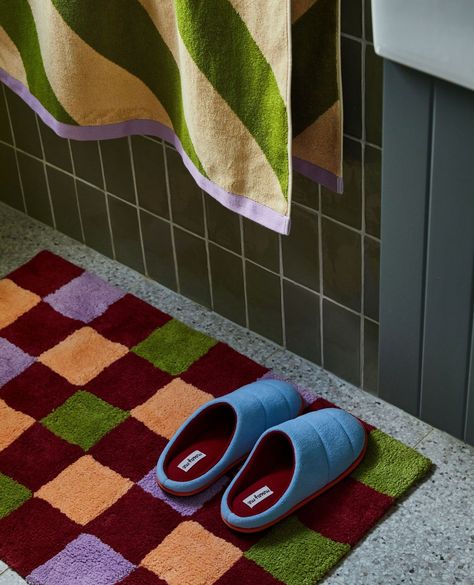 Time for a bathroom refresh? Our Clover collection has you covered. Take your bathroom routine up a notch or two with vibrant bathmats, lush towels, cute cosmetic bags and even comfy slippers! With out biggest range to date, find your next forever bathroom piece online now. Cute Bathmat Bathroom Rugs, Orange Bath Rug, Rainbow Bathroom Decor, Fun Bath Mats, Autumnal Palette, Bath Mat Runner, Tea Time Table, Designer Aesthetic, Carpet Bathroom