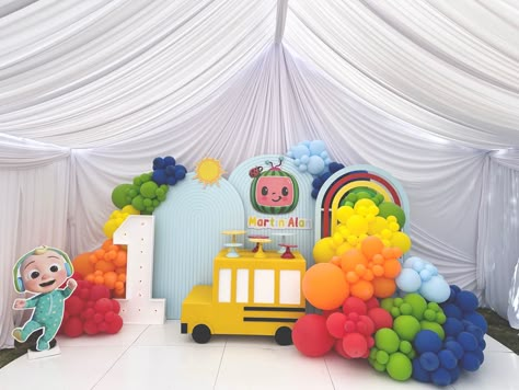 Cocomelon theme birthday party first birthday #bus #busprop #rainbow Cocomelon Balloons, Cocomelon Theme Birthday Party, Bus Journey, Melon Birthday, Balloons Backdrop, Cocomelon Theme, Kids Party Tables, Water Birthday, Birthday Theme Decoration