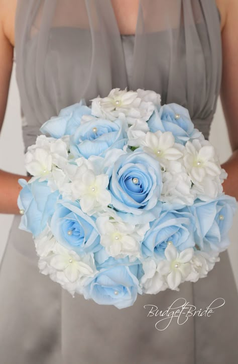 This stunning brides bouquet is an all round bouquet with Capri blue roses each with a pearl center, ivory hydrangea and white stephanotis with pearl centers. This bouquet is approx 12 inches wide Ice Blue Weddings, Light Blue Quince, Ivory Hydrangea, Cinderella Quinceanera Themes, Quinceanera Bouquet, Sky Blue Weddings, Blue Sweet 16, Red Bouquet Wedding, Light Blue Wedding