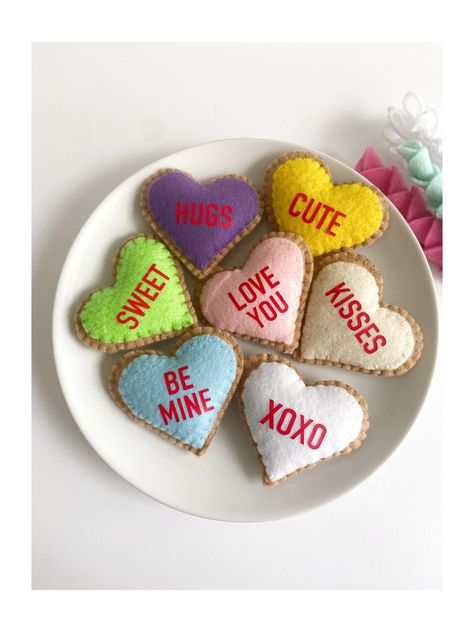 Beautiful Valentine's Day Felt Conversation Heart cookie or candy. Valentines Shaped Heart Sugar Cookie with love words. Perfect decoration for you favorite place or to gift the person you love.  These ornaments are also perfect to use as party favors or to bring to your kids classmates.  DETAILS: *The listing is for a set of 7 felt cookies or without loop, please select it in the dropdown menu. The ones in the pic are without the loop.  *Each Heart ornament size is 3". These ornaments are 100% Cookies Valentines Day, Felt Valentine, Felt Cookies, Cookies Valentines, Valentine Garland, Diy Valentines Decorations, Diy Valentines Crafts, Felt Heart, My Funny Valentine