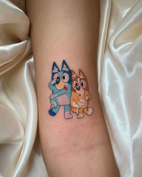 Tattoo Ideas Bluey, Bluey Tattoo Ideas, Celeste Tattoo, Bluey Tattoos, Pixar Tattoo, Darwin Tattoo, Kawaii Tattoo Ideas, Cross Tattoo Neck, Matching Tattoos For Couples