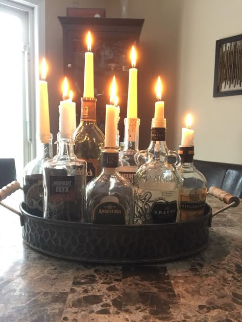 Classy Halloween Party, Old Liquor Bottles, Liquor Bottle Crafts, Classy Halloween, Spooky Halloween Party, Man Cave Home Bar, Bottle Candles, Alcohol Bottles, Old Bottles