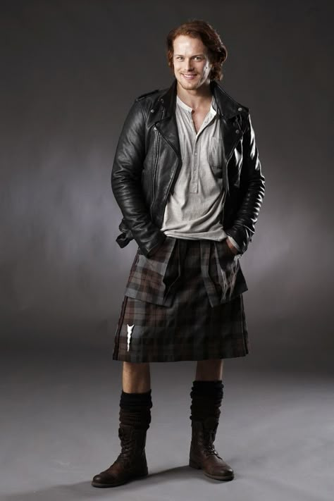 Sam Heughan = Jamie Fraser. I love the impish grin- and the contrast of the leather jacket with the kilt. | Outfitting 'Outlander' for 18th Century Scotland Gabaldon Outlander, James Fraser Outlander, Diana Gabaldon Outlander, Outlander Book Series, Jamie Fraser Sam Heughan, Jamie Fraser Outlander, Sam Heughan Outlander, Claire Fraser, Outlander Book