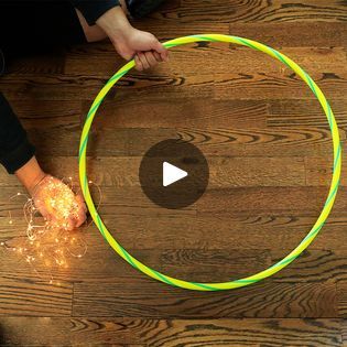 Wrap string light around a hula hoop for this GORGEOUS lighting idea! | Wrap string light around a hula hoop for this GORGEOUS lighting idea! | By HometalkFacebook Hula Hoop Christmas Decoration, Hula Hoop Light, Hula Hoop Rug, Hula Hoops, Home Fix, Hula Hoop, Dollar Store Crafts, Crafts To Sell, String Lights