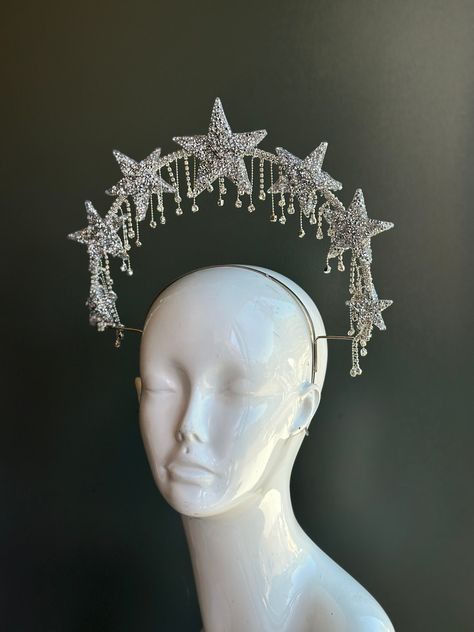 Dazzle and Sparkle bright in this Star studded jewel halo festival crown. We can customize design to match your outfit, get in touch for a design consultation and custom quote.  S H I P P I N G -  Processed same day or within 24 hours.  1-2 day guaranteed delivery, add item to cart, click shipping tab for rates.  Pls leave a check out note with your need date & contact number  Msg for delivery time frames (Include your state/country) S I Z E  Adult size. For children, pls contact to resizing or Crescent Moon Headpiece, Star Head Piece, Star Princess Aesthetic, Star Goddess Costume, Moon Crown Goddesses, Mirror Headpiece, Jeweled Outfit, Moon Costume Ideas, Space Headpiece