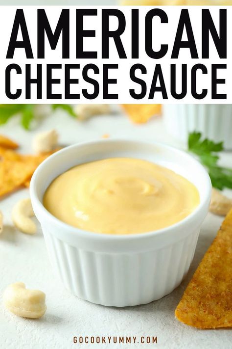 American homemade cheese sauce in a white ceramic bowl near nuts and nachos on a white table. American Cheese Dip, American Cheese Recipes, American Cheese Sauce, Nachos Fries, Easy Nacho Cheese, Simple Cheese Sauce, Velveeta Cheese Sauce, Melted Cheese Sauce, Easy Cheese Dip