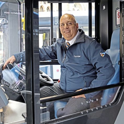 Depot supervisor at Idle, Nick Coleman, demonstrates the new uniform for Flying Tiger drivers Bus Driver Costume, Anti Aesthetic, Driver Uniform, Percy Jackson Musical, Clever Costumes, Lightning Thief, The Lightning Thief, Flying Tiger, Bus Coach