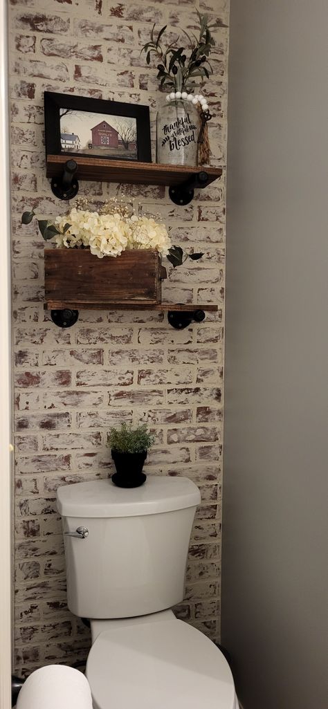 Brick Wall Bathroom Small Spaces, Toliet Room Accent Wall, Powder Room Brick Wallpaper, Half Bathroom Makeover Farmhouse, Brick Half Bath, Brick Paneling In Bathroom, Painted Brick Bathroom Wall, Accent Wall For Half Bath, Faux Brick In Bathroom