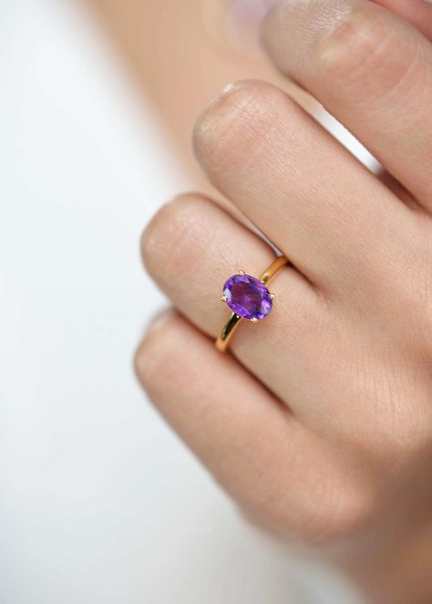 Our Dark Amethyst ring features a single deep purple genuine amethyst set in a four-prong setting on a 2mm gold vermeil band. A classic style that will stand the test of the time and is perfect for stacking. DETAILS * Dimension - Oval Stone - 8mm x 6mm Diameter, band width - 2mm * Materials - 18k thick gold vermeil over sterling silver, natural genuine dark purple amethyst stone * RING SIZER - If you have any questions about the stone or the ring size, please don't hesitate to send me a dm. If y Purple Stone Rings, Dark Amethyst, Custom Jewelry Box, Amethyst Set, Purple Amethyst Ring, Purple Rings, Box Making, Fancy Jewellery, Birthstone Gifts