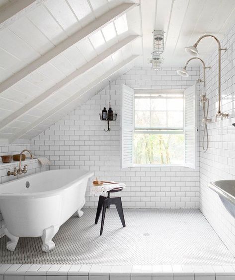 Not only will adding an attic bathroom give your partner, children, or guests their own private space, it will also make sure the upper level is more than just a dinky storage zone. Some of our favorite designers took on the attic bathroom design challenge (with great results), and here's how to bring their expertise to your own reno. #hunkerhome #bathroom #atticbathroom #bathroomideas #bathroominspo Attic Bathrooms, Attic Bathroom Ideas, Makeover Kamar Mandi, Slanted Walls, Ford Interior, Open Showers, Slanted Ceiling, Small Attic, Attic Bathroom