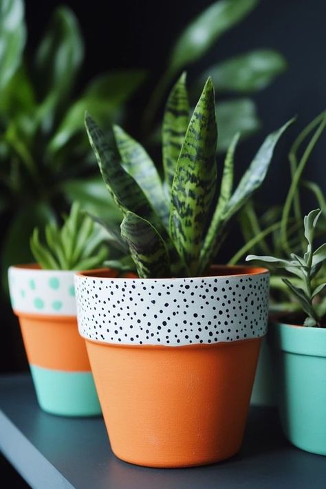 "Brighten up your garden with DIY Painted Terra Cotta Pots! 🎨🪴 Perfect for adding a splash of color to your plants. 🌟✨ #PaintedPots #DIYProjects #GardenDecor" Painted Flower Pots Aesthetic, Diy Painted Pots Ideas, Terracotta Pots Painted Diy, Cute Planter Ideas, Painted Terra Cotta Pots Ideas, Diy Painted Terra Cotta Pots, Painted Pots Diy Terra Cotta, Terra Cotta Pot Painting, Diy Painted Flower Pots