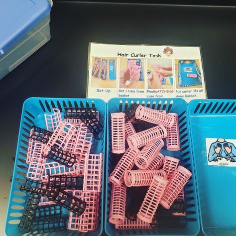 Hair curler task box. I got these hair curlers a few years ago at Dollar Tree. I love this task box for following directions, sorting, simple assembly, fine motor skills , crossing midline, and increasing independence. The step by step visual directions for this task box and more are on my tpt store. Link in bio #quarenteach #lifeskills #lifeskillsteacher #lifeskillclass #taskboxes #taskbox #sped #specialeducation #specialeducationteacher #spedteacherspayteachers #teacherspayteachers #tpt #aba # Dollar Store Task Box Ideas, Dollar Tree Task Boxes For Special Education, Task Boxes Preschool, Fine Motor Centers, Dramatic Play Activities, Teacch Tasks, Senior Living Activities, Life Skills Class, Vocational Skills