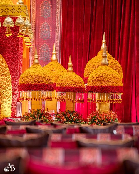 Traditional temple structure blooms with elegance, featuring florals that embody beauty and reverence. Tassels dance gently in the breeze, while props add a unique charm to the setting. Each detail exudes warmth and grace, ideal for a sacred space. A stunning blend of art and devotion. “ Aarambh” For The Arora’s Decor and Design - @abhinavbhagatevents Photography - @atozo.in Rentals - @sunny.dua.1232 @houseoffurniture97 Production & Planning - @touchwoodgroup Lighting & Technicals - @l... Abhinav Bhagat Decor, Temple Decoration Indian, Indian Floral Decor, Haldi Decor Ideas, Ambience Decor, Production Planning, Temple Decoration, Royal Indian Wedding, Haldi Decor