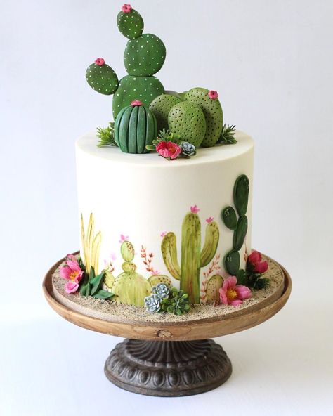 I’ve got a lot of these cute cactus cakes on my schedule!  This one was from this past week!  Cactuses are handpainted onto buttercream… Cactus Cakes, Cactus Decorations, Edible Sand, Sweet Sticks, Succulent Cake, Cactus Cake, Fiesta Cake, Cactus Party, Cute Cactus