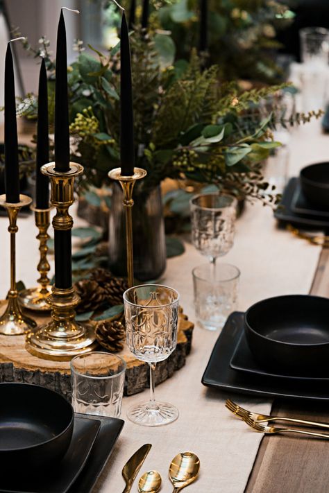 How to Style a Dinner Party Tablescape for the Holidays and Beyond - Avenue Calgary Masculine Dinner Table Decor, Moody Christmas Table Setting, Christmas Tablescapes Modern, Place Setting With Bowl And Napkin, Christmas Table Settings Black And Gold, Black Christmas Tablescape, Dark Christmas Tablescape, New Year’s Eve Party Table Setting, Dark And Moody Dinner Party