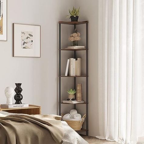 This storage shelves can be used as a corner bookshelf, display shelf, storage shelf or plant shelf in any corner of the living room, bedroom, home office, kitchen, hallway, balcony and bathroom. The classic combination of rustic brown and black of the 5-tier corner standing shelf combines the charm of classical and modern furniture styles. I am posting an affiliated link. Corner Shelf Stand, Corner Bookshelf, Shelves Display, Tall Shelves, Shelf Stand, Wall Corner, Corner Bookshelves, Modern Style Furniture, Standing Shelves