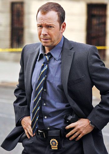 Daniel Fitzgerald “Danny” Reagan(played by Donnie Wahlberg) - the oldest child of Frank and Mary Reagan, and the older brother of Erin, Joe and Jamie. Danny is an investigator of New York City's 54th Precinct’s Detective Squad, specializing in Major Crimes, and doing what needs to be done to serve justice in the fight against crime. Danny Reagan, Blue Bloods Tv Show, Donnie Wahlberg, Tom Selleck, Police Detective, New Kids On The Block, Blue Bloods, Grey Blazer, Tv Guide