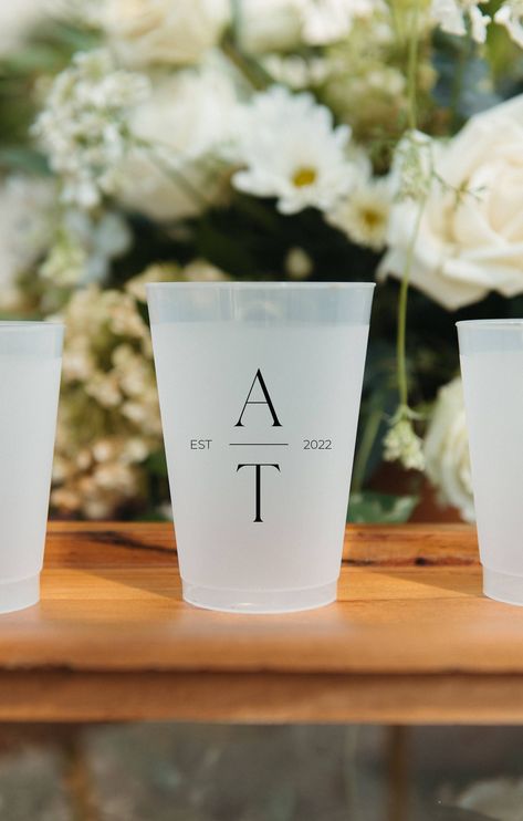 Personalized shatterproof flex cups are a must for special events! Our personalized plastic cups will add the perfect touch to your next event! Choose from our selection of cup sizes and ink color options to customize these cups to fit your event colors. We suggest ordering 1 cup per guest for each hour of your event.  ---------------- TO ORDER: ---------------- 1. Choose your quantity 2. Choose your cup size. 3. Info box - Include ink color choice, names, wedding date & location in the information box (or any changes you want to be made to the text) & the desired date cups are needed. ------------------------------------- PRODUCTION & SHIPPING: ------------------------------------- A proof will be provided of your design before it is put into production, usually within 48 hours.  Please a Cups For Wedding, Wedding Cup Ideas, Guest Favors, Bridal Cups, Disposable Cups Wedding, Wedding Favor Cups, Custom Cups Wedding, Cup Wedding Favors, Wedding Cups For Guests