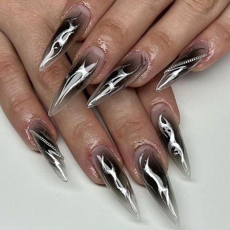 lissette on Instagram: "silver tribal over black aura🖤 i can literally paint tribal on autopilot at this point 🤣 keep them coming!! inspo @pinkk.nailsss & @kittypaw_studio <3 DM to book! #nails #gelx #gelxnails #gelnails #airbrushnails #nailart #handpaintednailart #auranails" Neotribal Nails, Black With Silver Nails, Paint Nails Ideas, 2yk Nails, Transparent Black Nails, Black Silver Nails Design, Cybersigilism Nails, Black Nails Silver, Silver Black Nails