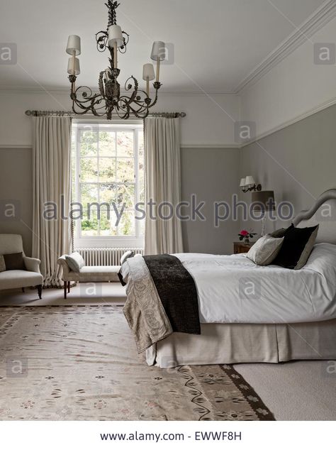 Elegant bedroom painted in Pale Walnut by Dulux with an Aubusson rug. The curtains are in Abbot and Boyd's Lins Brodes Stock Photo White Gloss Bedroom Furniture, Grey Carpet Bedroom, Light Gray Bedroom, Bedroom Comforter Sets, Black Bedroom Design, Elegant Bedroom Decor, Wood Bedroom Sets, Painted Bedroom Furniture, The Curtains