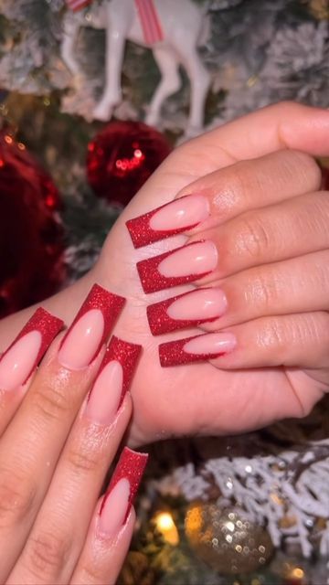 Red Nail Designs Sparkly, Dark Red Glitter French Tip Nails, Red French Tip Nails With Silver Line, Red French Tip With Initial, Christmas Acrylic Nails Holiday Long, Red Glitter French Tip Nails Christmas, Red Glitter Nails French Tip, Red French Glitter Nails, Red Christmas French Nails