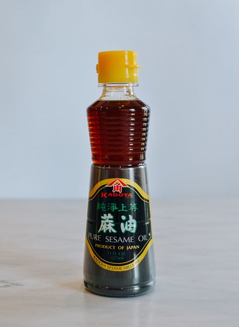 Sesame Oil: Everything You Need to Know | The Woks of Life Cooking With Sesame Oil, Sesame Oil Chicken, Amber Oil, Wok Of Life, Asian Cucumber Salad, Woks Of Life, The Woks Of Life, Meat Marinade, Asian Grocery