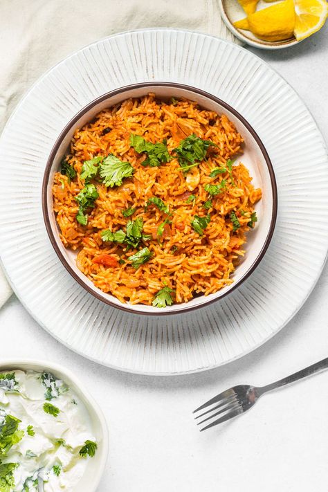 This Biryani-Style Tomato Rice Brims With Tomato Flavor Casseroles With Rice, Simply Recipe, Tomato Rice Recipe, Flavor Rice, Pizza Rice, Labor Day Recipes, Cottage Recipes, Recipes In Marathi, Recipes For 2